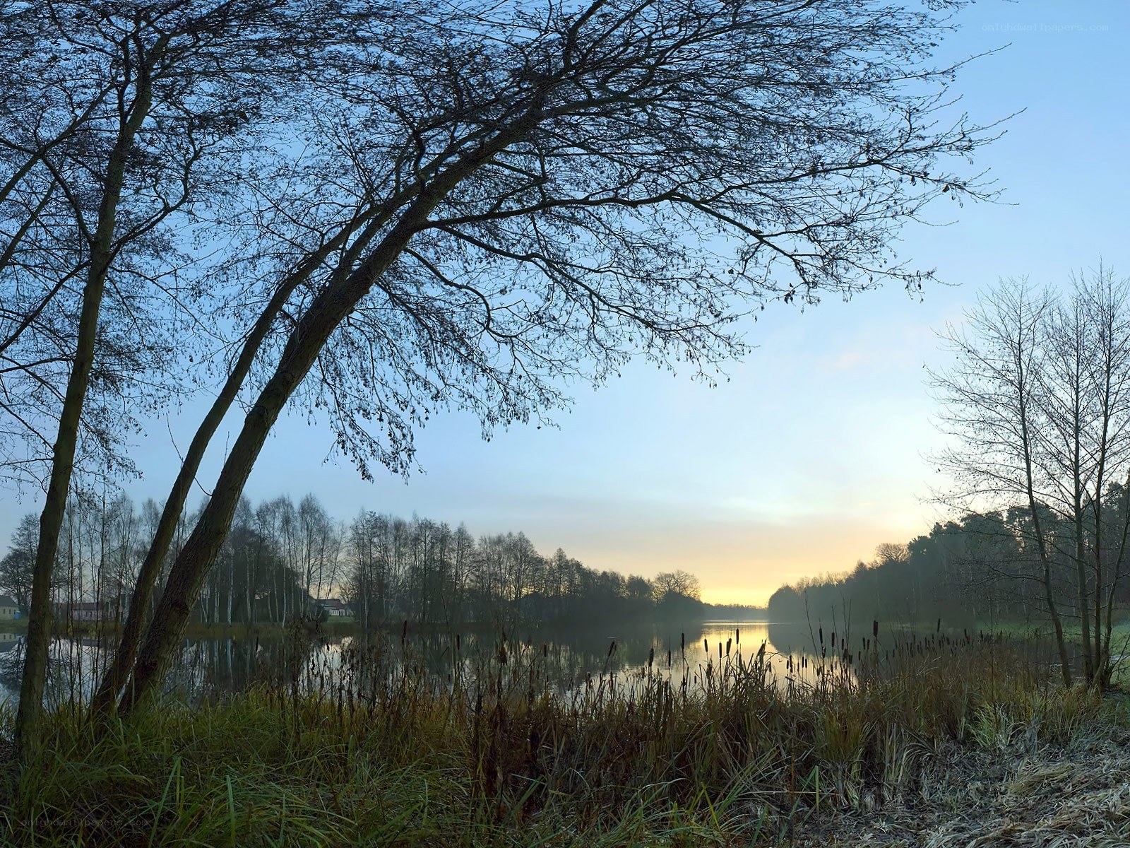 Sunrise over a calm lake