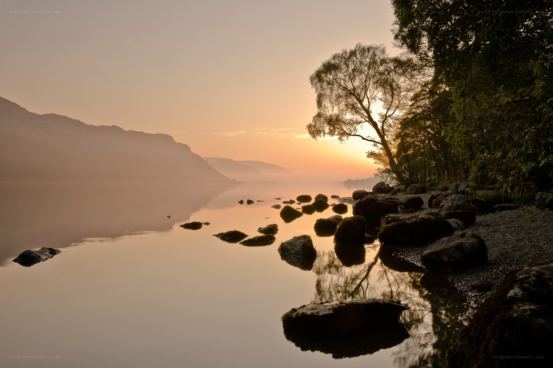 Sunrise over a calm lake