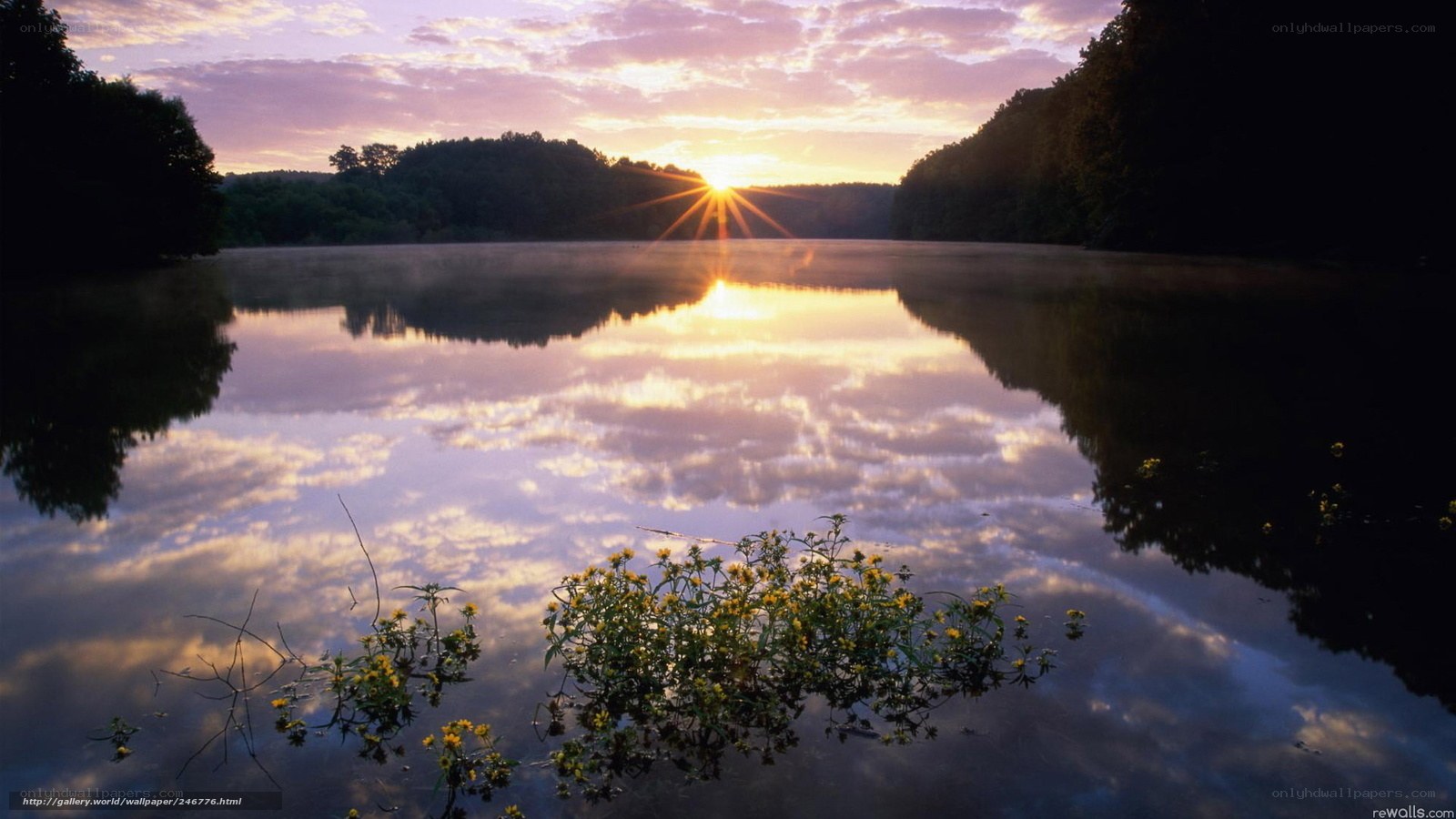 Sunrise over a calm lake