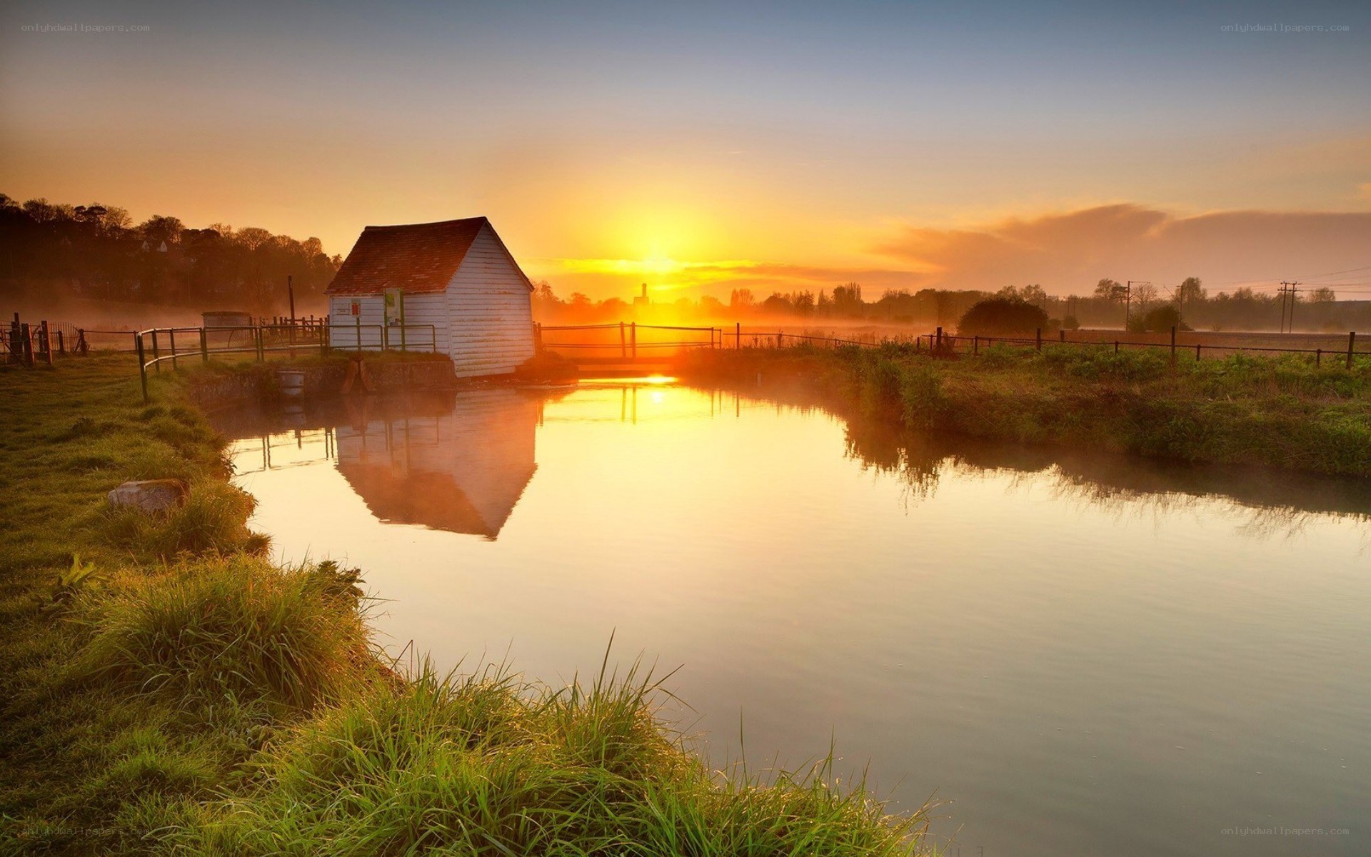 Sunrise over a canal cottage