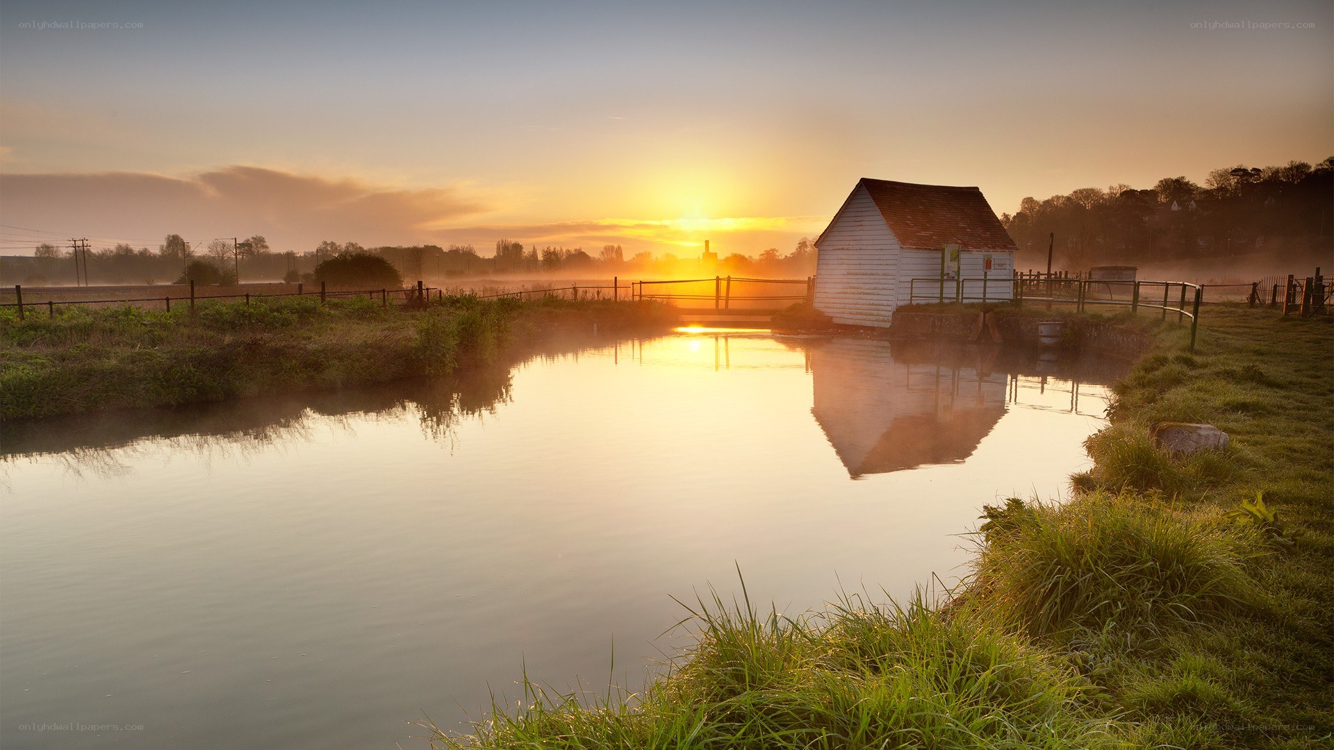 Sunrise over a canal cottage