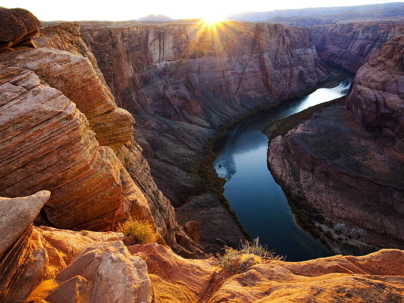 Sunrise over a river canyon
