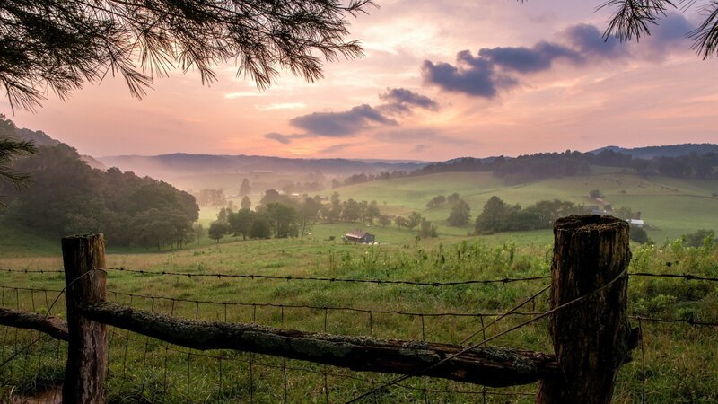 Sunrise over a rural valley