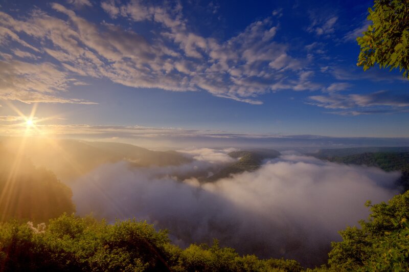 Sunrise over a sea of clouds