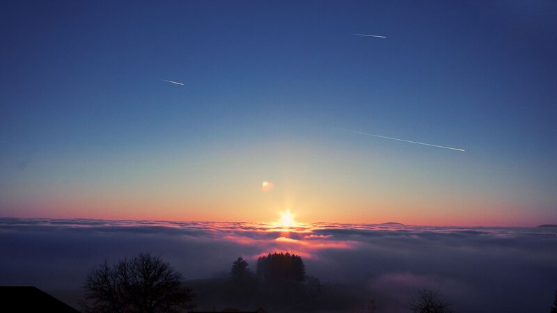 Sunrise over a sea of clouds