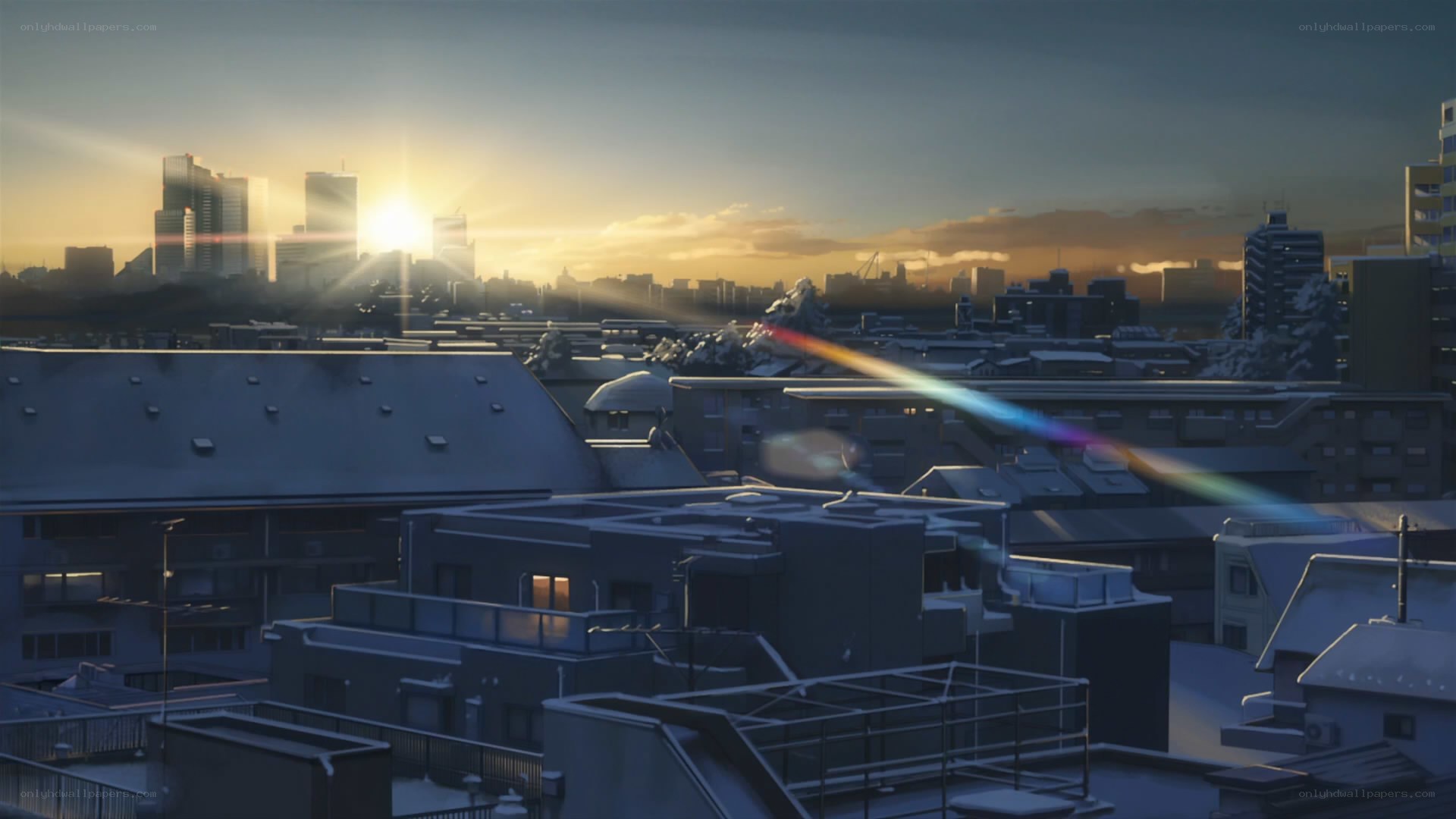 Sunrise over a snowy city