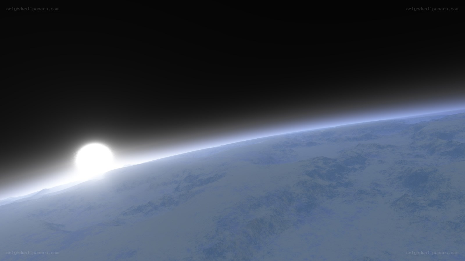 Sunrise over a snowy planet