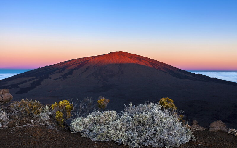 Sunrise over a volcanic peak