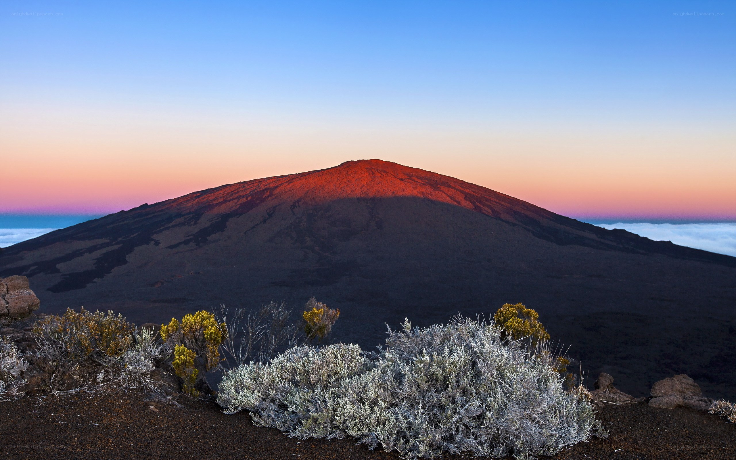 Sunrise over a volcanic peak