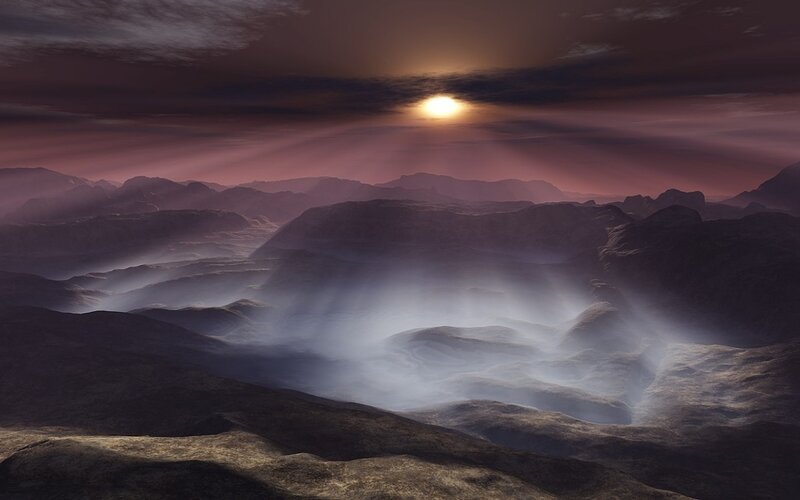 Sunrise over alien mountains