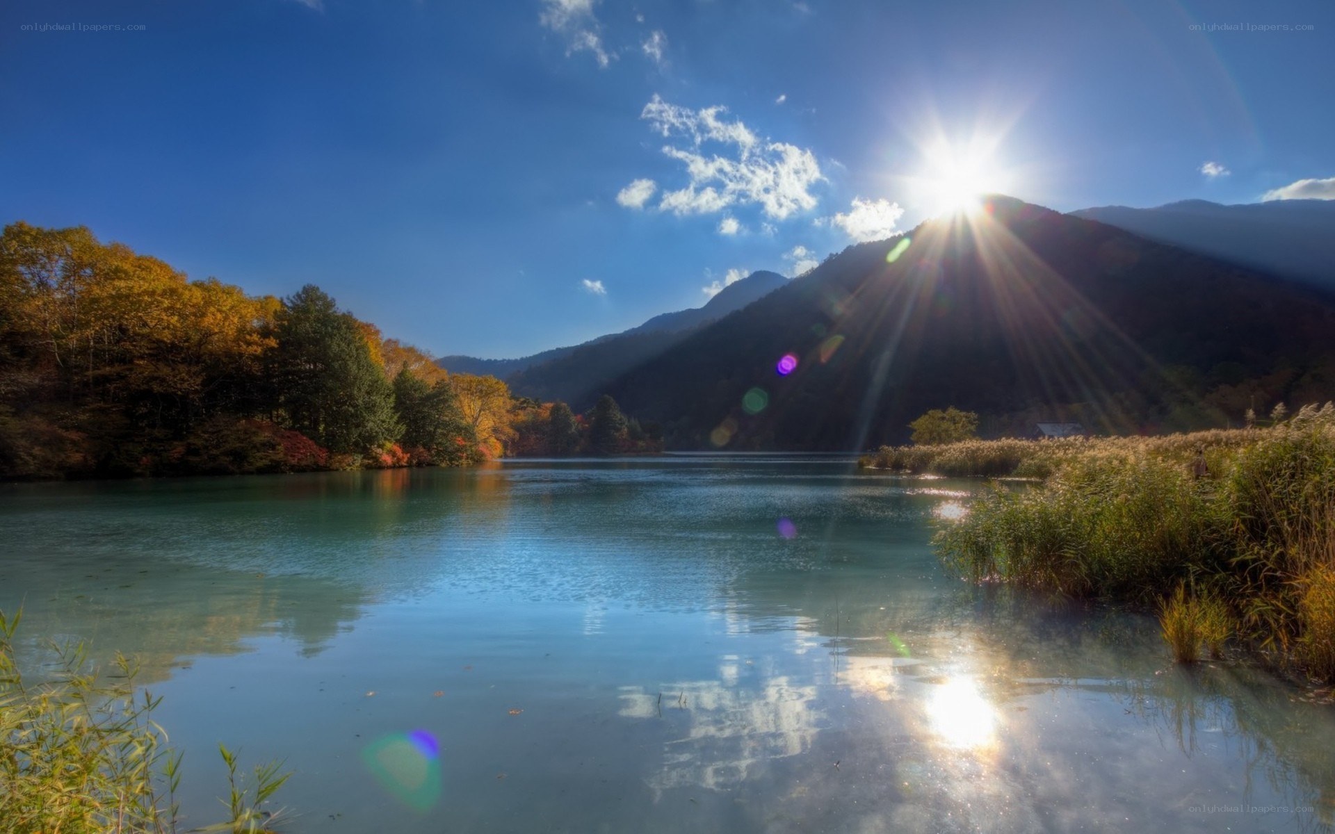 Sunrise over autumn lake