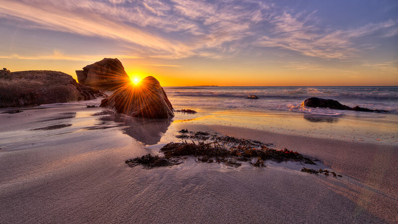 Sunrise over Beach Rocks