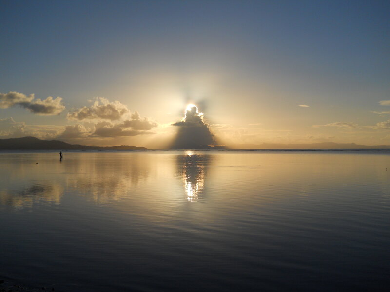 Sunrise over Calm Water
