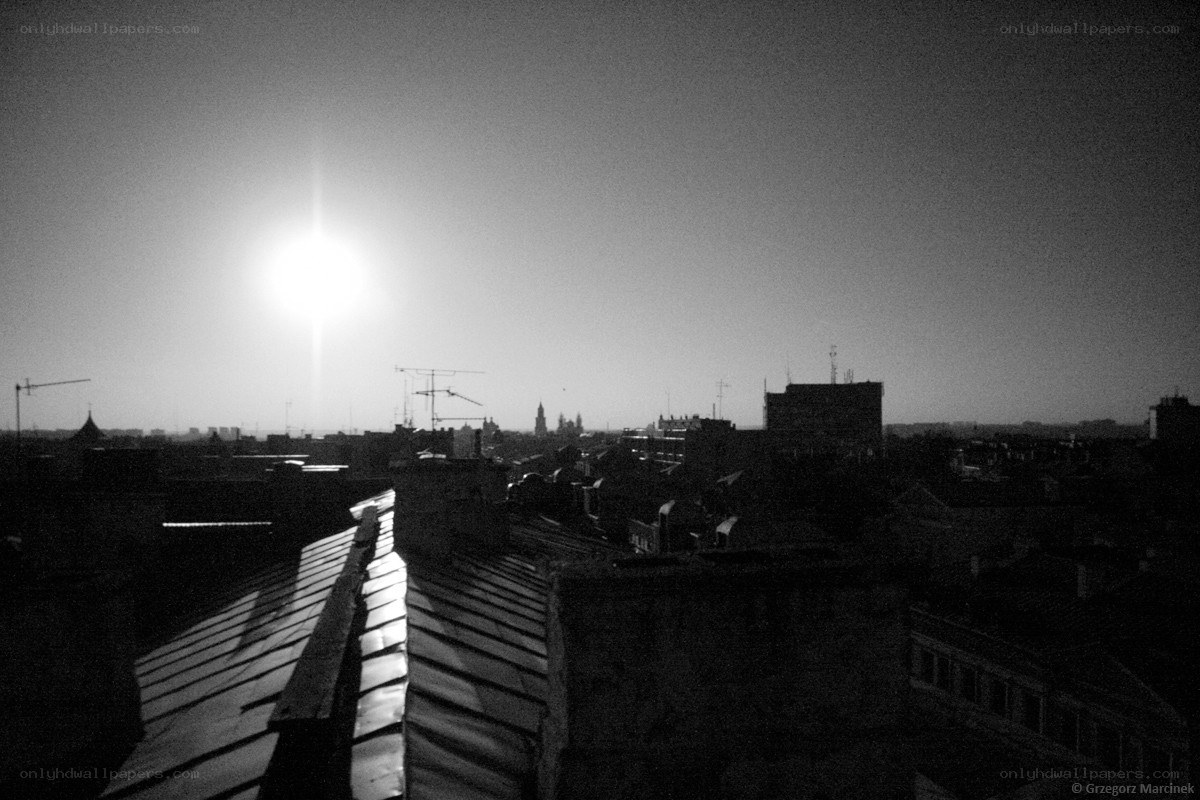 Sunrise over city rooftops