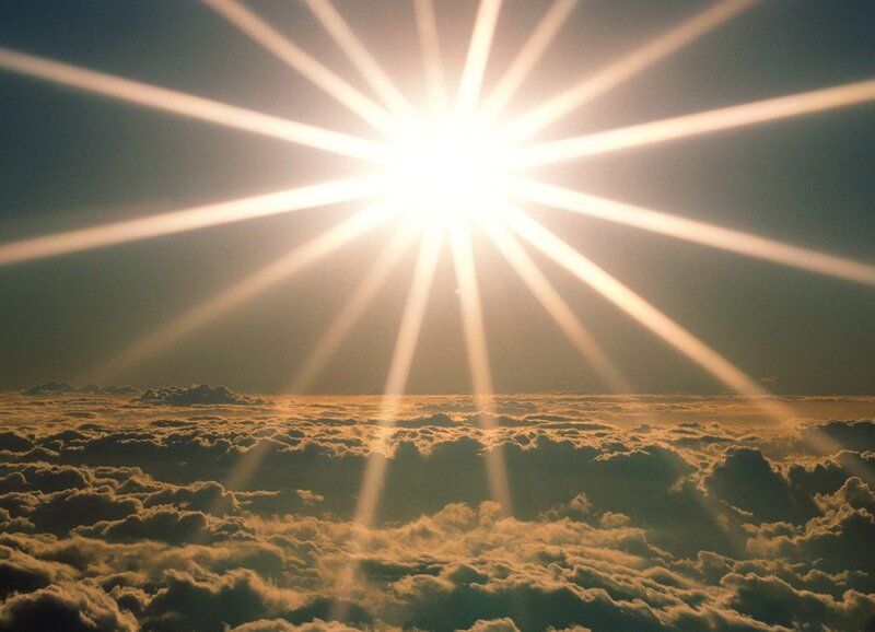 Sunrise over clouds