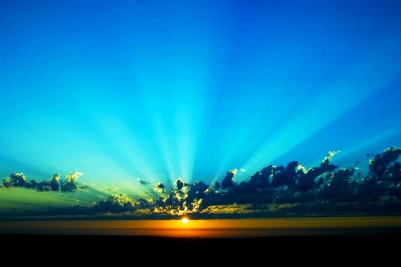 Sunrise over Clouds — Blue, Dramatic