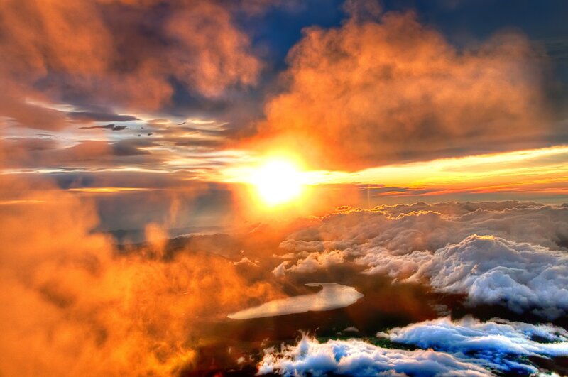 Sunrise over Clouds — Orange, Dramatic, Photograph, Sun, Lake, Yellow, Blue