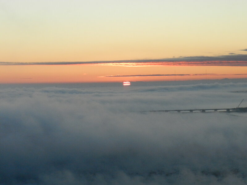 Sunrise over Clouds — Orange, Serene, Photograph, Bridge