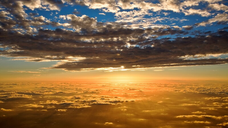Sunrise over Clouds — Orange, Serene