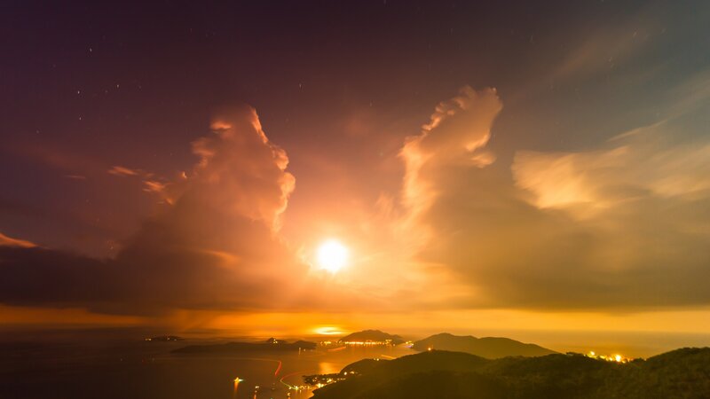 Sunrise over Coastal Hills — Orange
