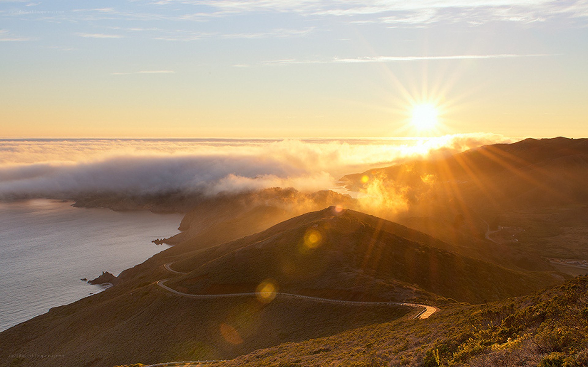 Sunrise over coastal hills