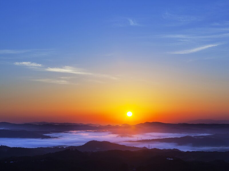 Sunrise over Foggy Hills — Blue