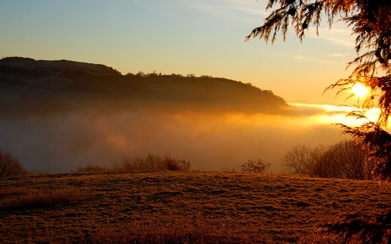 Sunrise over Foggy Valley — Orange, Serene