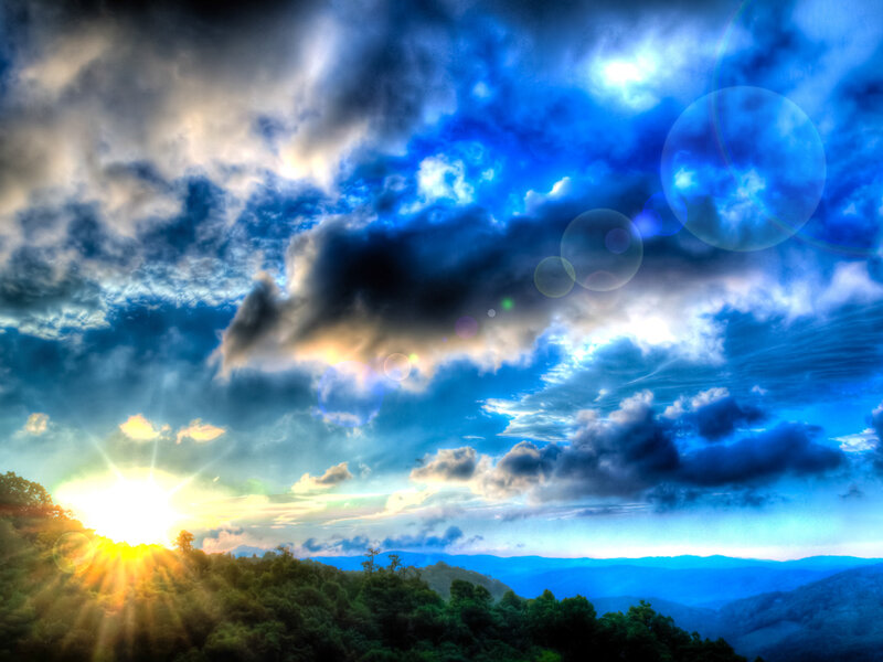 Sunrise over Forested Hills — Blue