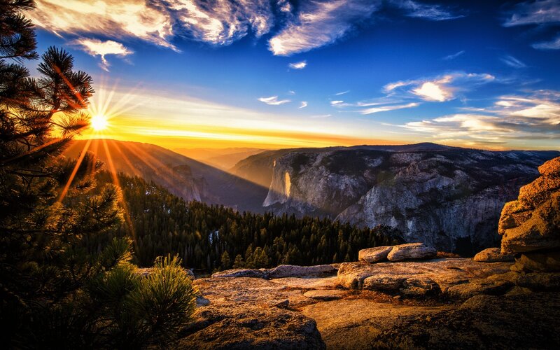 Sunrise over Granite Cliffs — Blue, Dramatic, Photograph