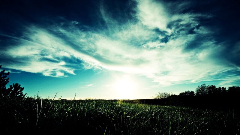 Sunrise over Grass Field — Green, Dramatic, Photograph, Clouds, Trees