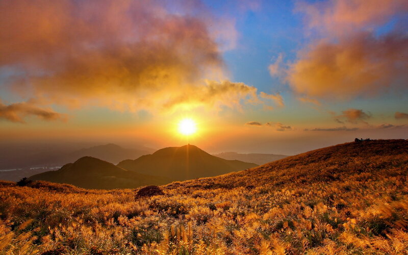 Sunrise over Grassy Hills — Orange