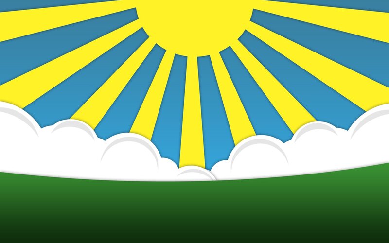 sunrise over green field