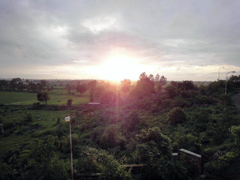 Sunrise over Green Fields