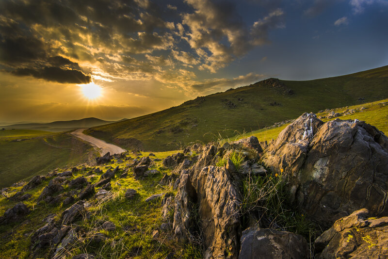 Sunrise over Green Hills — Dramatic, Photograph, Road