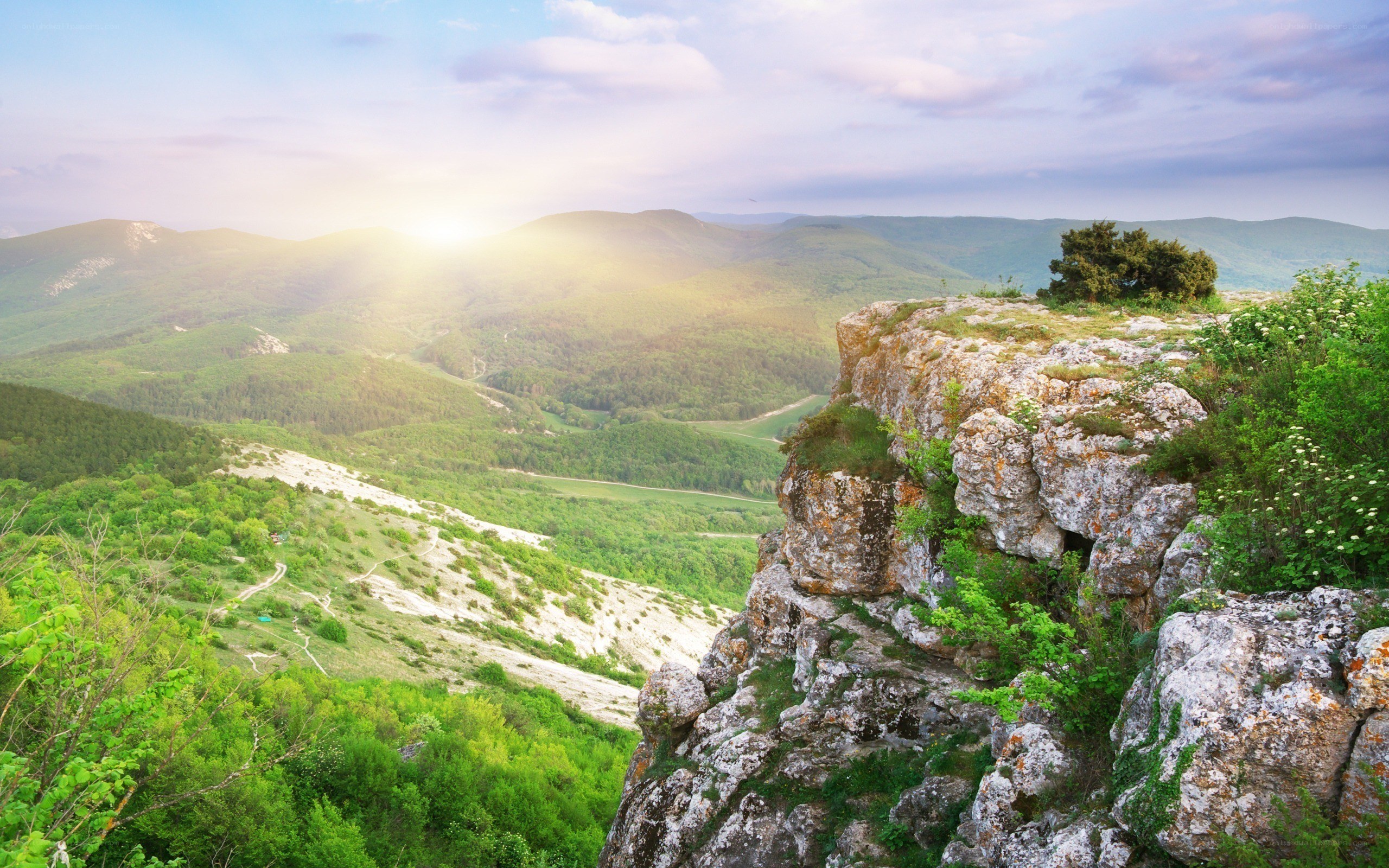 Sunrise over green mountains