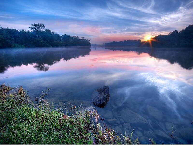 Sunrise over Lake — Blue, Serene, Photograph, Trees, Fog, Rocks