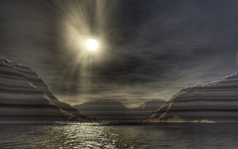 Sunrise over layered mountains