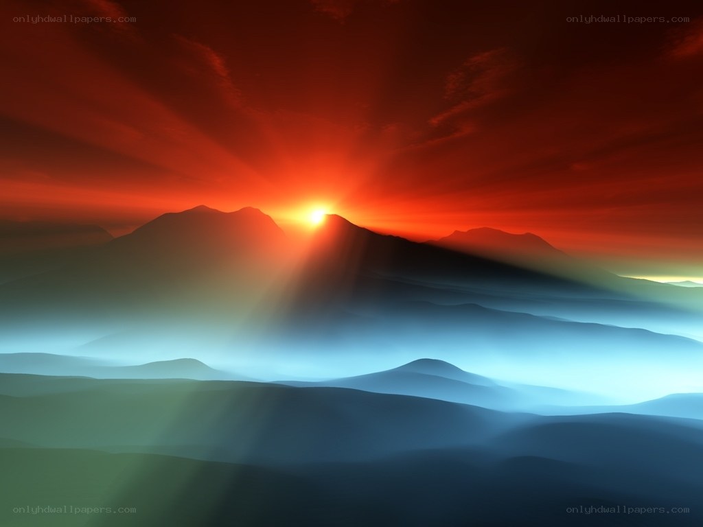 Sunrise over misty mountains