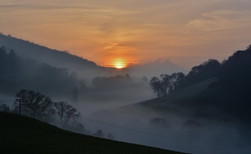 Sunrise over Misty Valley — Orange, Serene