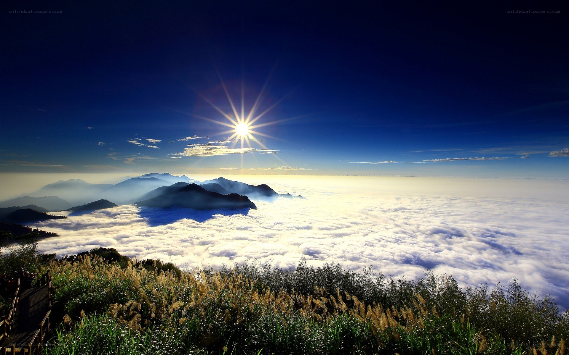 Sunrise over mountain clouds