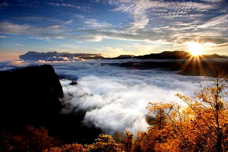Sunrise over mountain clouds