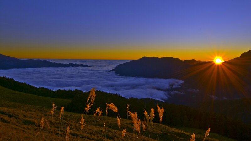 Sunrise over Mountain Clouds — Blue