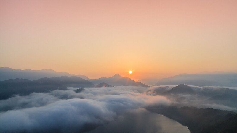Sunrise over Mountain Clouds — Orange