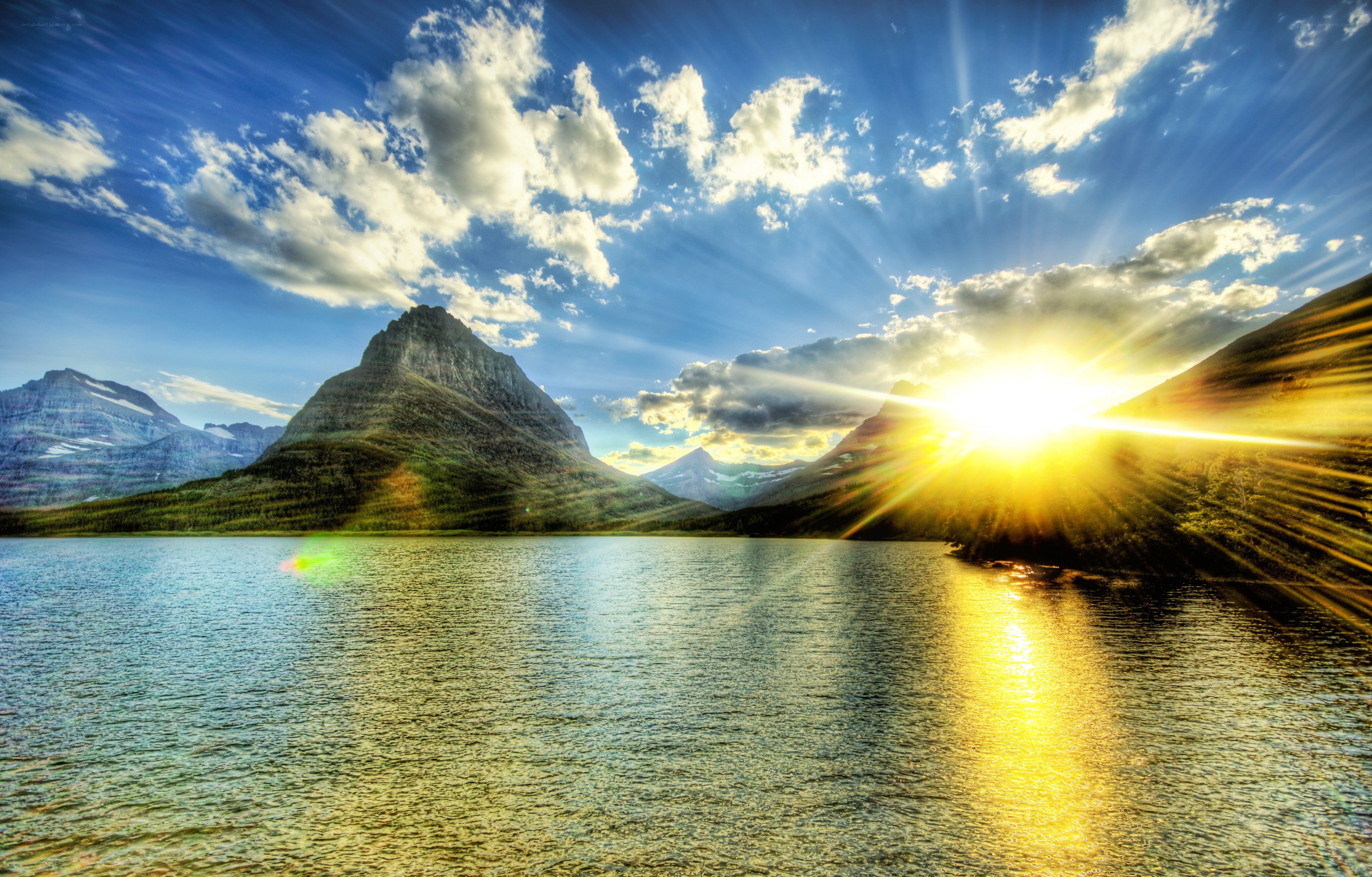 Sunrise over mountain lake
