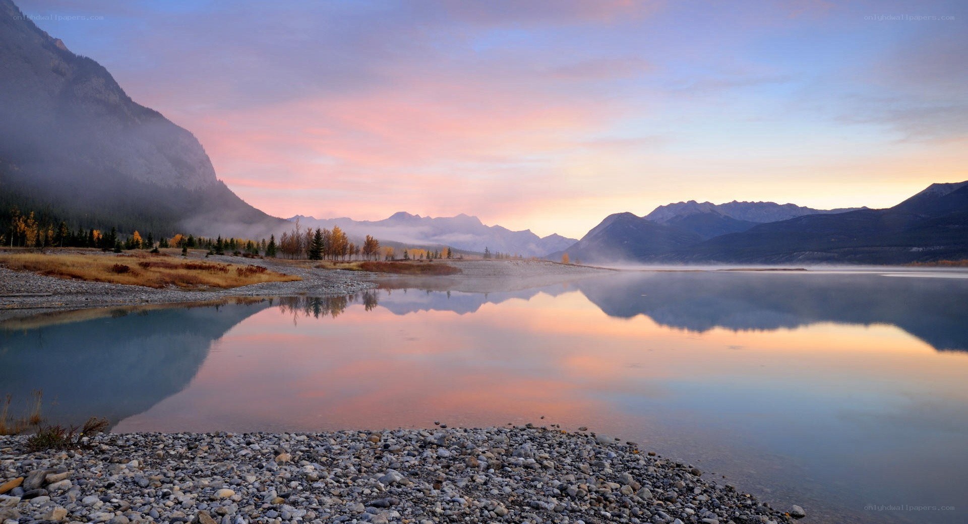 Sunrise over mountain lake