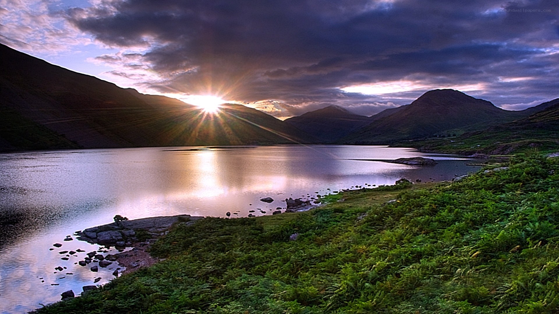 Sunrise over mountain lake