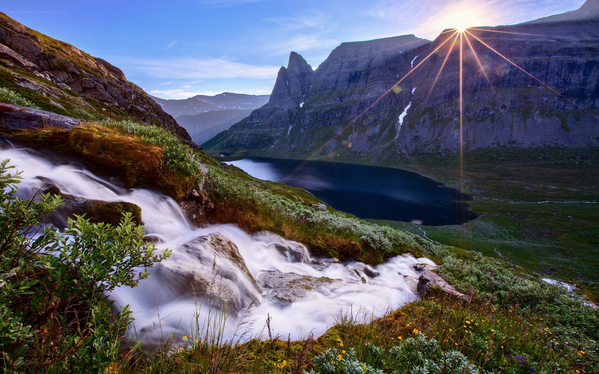 Sunrise over mountain lake