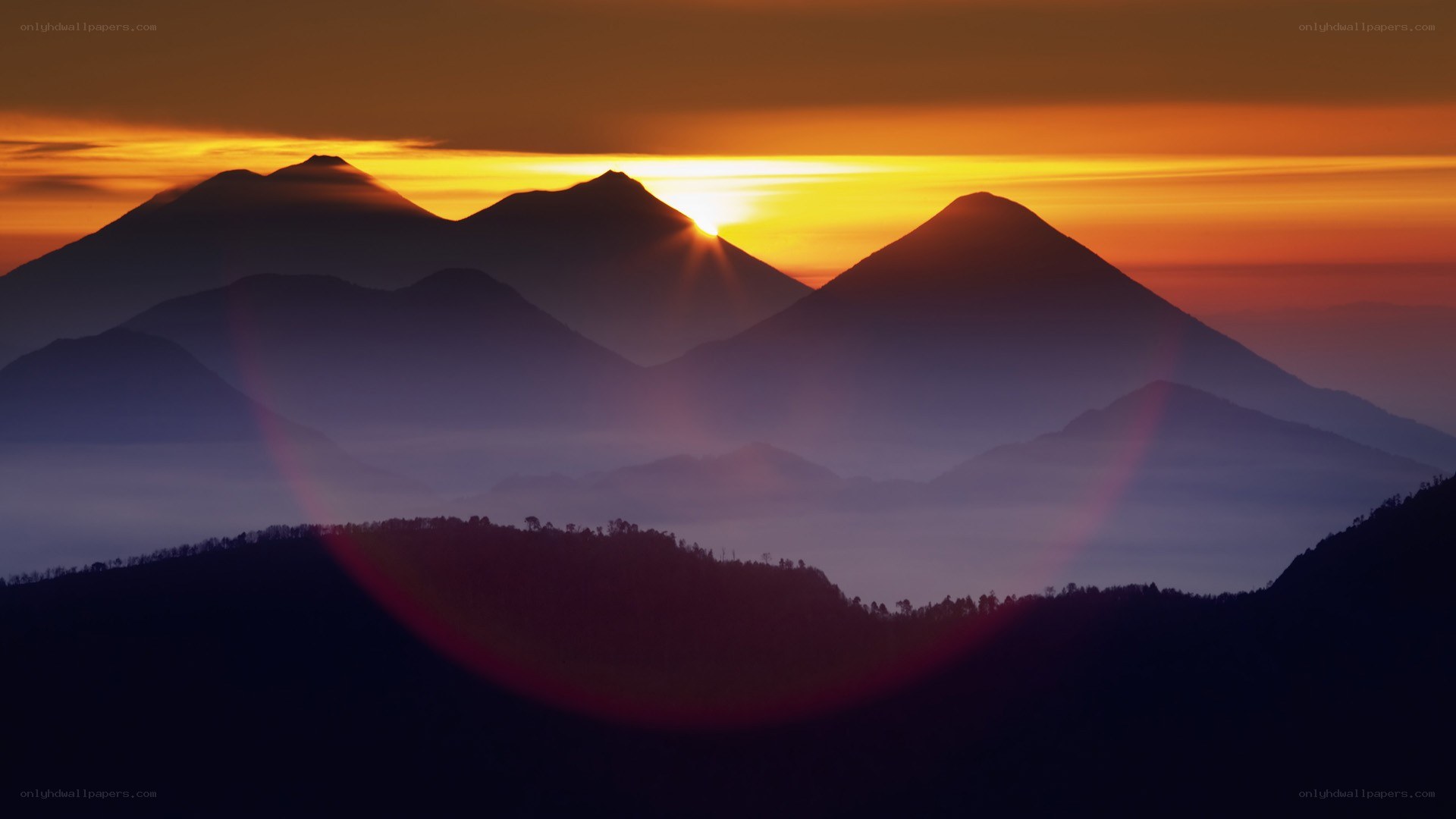 Sunrise over mountain peaks