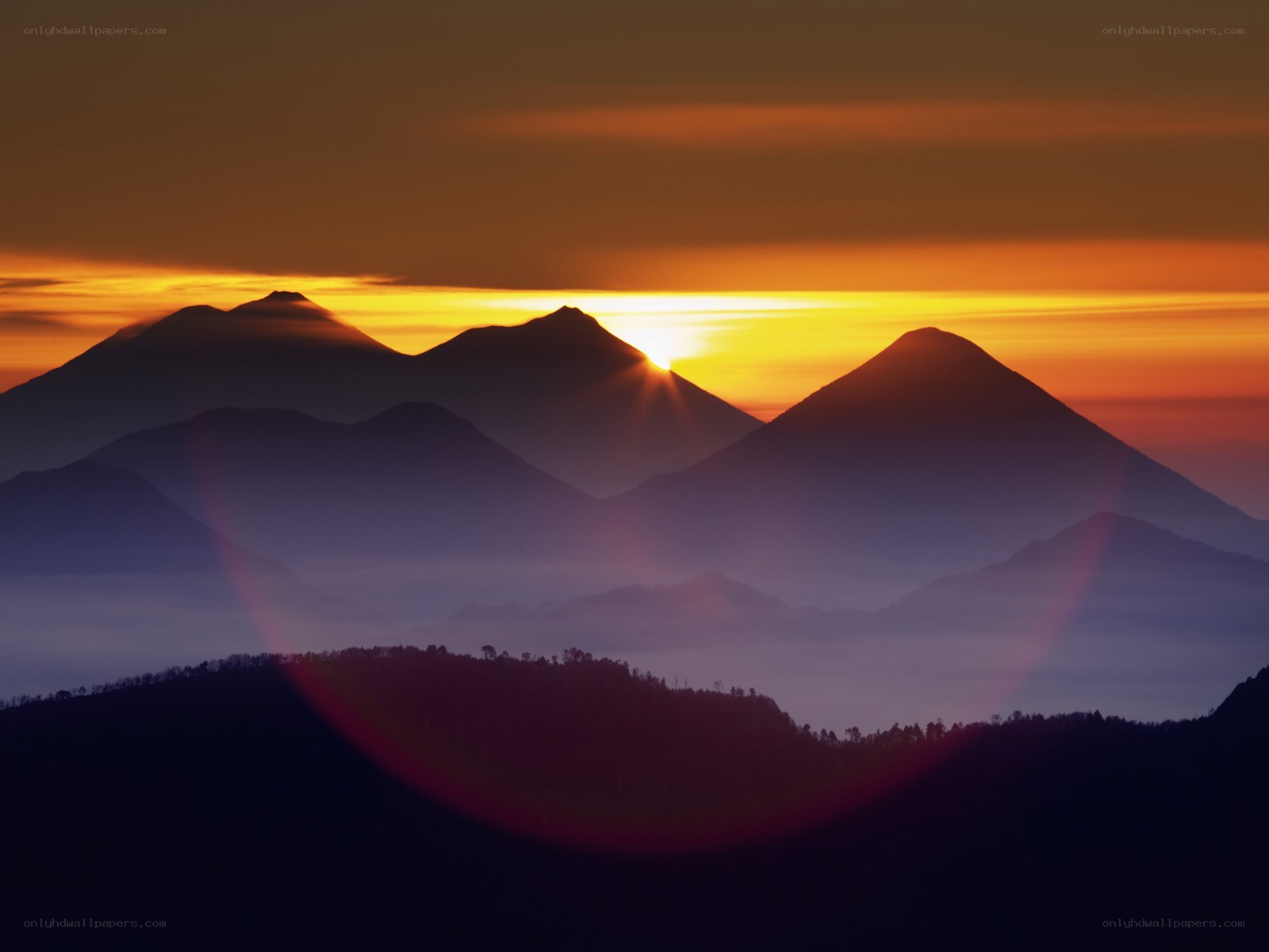 Sunrise over mountain peaks