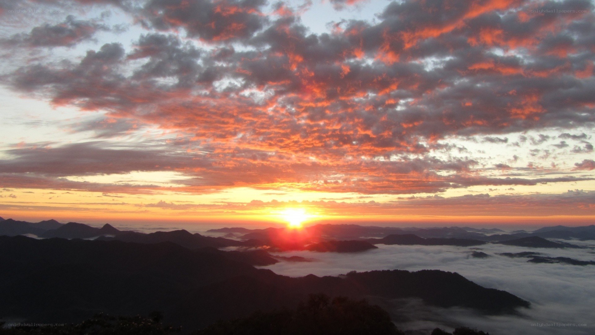 Sunrise over mountain peaks